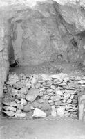 View of debris remaining in south-east end of the tomb