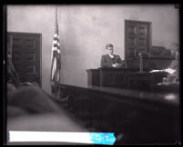 Paul Kelly on the witness stand during his murder trial, Los Angeles, 1927