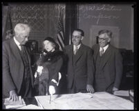 Actress Betty Compson meets with Councilmembers Charles A. Holland, Ernest L. Webster, and Charles H. Randall, Los Angeles, 1929