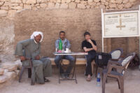 Project staff outside of tomb