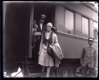 Gertrude Ederle and her mother arriving at a train station, Los Angeles, 1927