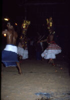 Theyyam festival - Thirayāṭṭam performance with two dancing aṅkakkāran (fighter) characters, Kalliasseri (India), 1984