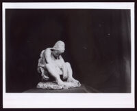 Clay figure of a seated mother with a baby on her back by Beulah Woodard, 1935-1955