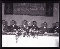 William E. Boeing with a group of men seated at a banquet table, Los Angeles, 1929