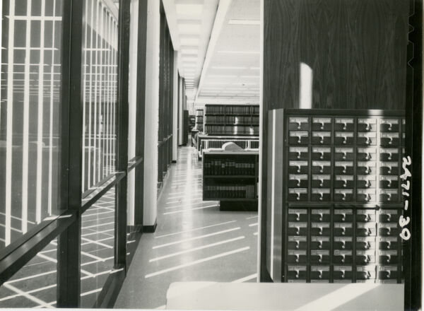 Archival black and white photograph from 1964 showing card catalogs at the UCLA University Research Library