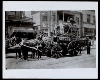 Negro Firemen's float in the Fiesta Parade, with Lieut. George Bright, Walter Brown, Sr. and Harry Brown, Los Angeles, 1909