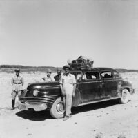 Group portrait with car