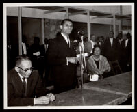 Loren Miller, seated, with Billy G. Mills and Eula English at the opening of the English Square office building, Los Angeles, 1964