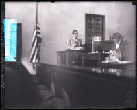 Perry Askam on the witness stand during actor Paul Kelly's murder trial, Los Angeles, 1927