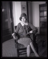 Eunice Pringle sitting on a chair during the Alexander Pantages rape trial, Los Angeles, 1929