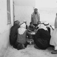 Bedouin men having a meal