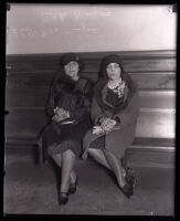 Wife and daughter of Asa Keyes wait to testify at his trial, Los Angeles, 1929