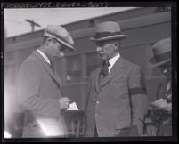 Reporters with Edgar Addison Bancroft, American Ambassador to Japan, at the Santa Fe train station, Los Angeles, 1924