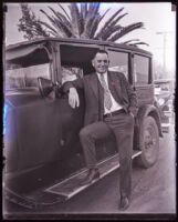 Man leaning on a car, Ventura County, 1928