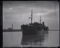 Ship called Freeport Sulphur No. 6, carrying killer Phil Alguin entering Brazos River, Freeport, Texas, 1923