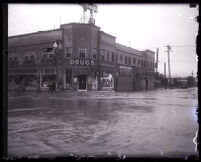 Flooded commercial intersection after heavy rains, Culber City, 1920s