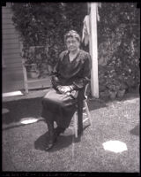 Abbie A. Adams sitting in a chair, Los Angeles, 1929