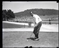 Golfer Ernie F. Combs on a golf course, Los Angeles, 1930s