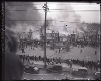 Auto show fire seen from across street, Los Angeles, 1929