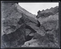 Upward view of the canyon rock face after the collapse of the Saint Francis Dam, San Francisquito Canyon (Calif.), 1928 