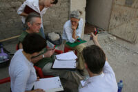 Staff meeting outside the Tomb of Menna