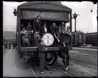 Duke and Duchess of Alba, aboard train, say farewell to hosts Douglas Fairbanks and Mary Pickford, Pasadena, 1924