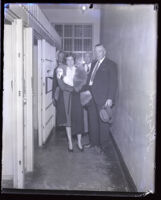 Winnie Ruth Judd with Lieutenant Detective Joseph Taylor and Dr. W. C. Judd outside of a holding cell, Los Angeles, 1931