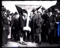 Actress Anna Q. Nilsson presents explorer Roald Amundsen with an ice pole, Union Station, Los Angeles, 1926