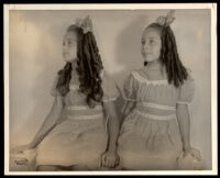 Two girls wearing identical dresses, friends of the Matthews family, 1940-1960