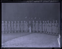Women's drill team poses as group before the American Legion Parade, Long Beach, 1931