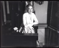 Edwina Booth, actress, in a witness box, Los Angeles, circa 1930s