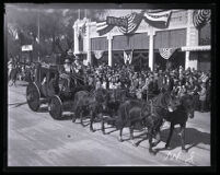 Carriage pulled by a team of horses in the Tournament of Roses Parade, Pasadena, 1924