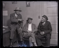 Detectives (?) and a taxicab driver (?) sitting in an office during the Leo Patrick Kelley murder case, Los Angeles, 1928