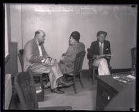  Dr. W. C. Judd, Carolina Judd, and Burton J. McKinnell during questioning at the police station, Los Angeles, 1931