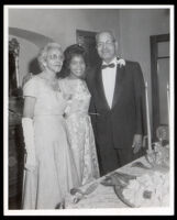 Drs. John and Vada Somerville celebrating their 50th wedding anniversary with Doris Howard, Los Angeles, 1962