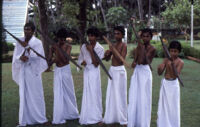Ona Villu Kottu - Nair boys perform music of Ona Villu Kottu on palmwood bows at the Casino Hotel, Thrissur (India), 1984