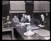 Former district attorney Asa Keyes with his defense team during his bribery trial, Los Angeles, 1929