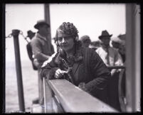 Minnie Kennedy by the ocean during search for Aimee Semple McPherson's body, Santa Monica, 1926