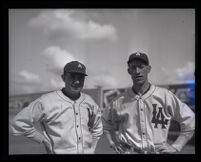 Outfielder Wally Hood and pitcher Buck Ramsey of the Los Angeles Angels smile for the camera, Los Angeles, 1925