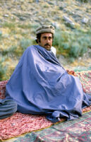 Mujahid Sits in Carpet