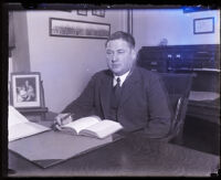 Judge Charles L. Bogue at a desk, Los Angeles, circa 1920s