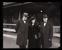 Supreme Court Justice Owen J. Roberts with Senator Atlee Pomerene and his wife arriving at the train station, Los Angeles, 1924