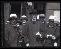 Exiled Bishop Manuel Azpeitia Palomar and priests at a train station before their return to Mexico, Los Angeles, 1929