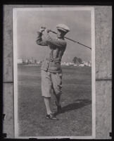 Professional golfer Harry Pressler swings at the Hacienda Golf Club, La Habra Heights, 1922-1940