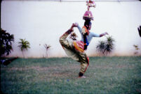 Om Periyaswamy dance troupe - Karakāṭṭam dance with a dancer in a karana pose, Madurai (India), 1984