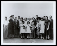 Group portrait of African American adults and children, 1940-1960