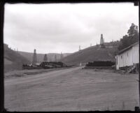Oil wells on hills, Whittier, 1920s
