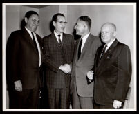 Ralph Bunche with three unidentified men, 1958