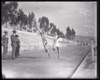 John Powers, Occidental College student, races on a track, Los Angeles [?], circa 1924