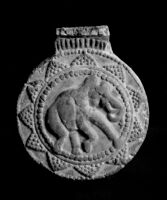 Collared medallion depicting an Elephant